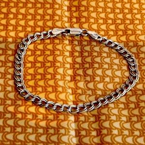 .925 STERLING SILVER CHARM BRACELET